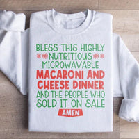 White sweatshirt with playful macaroni and cheese dinner print on front.