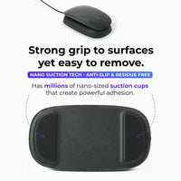 Side angle showing Magic Mouse 2 on charger with the long braided USB-A to Lightning cable.
