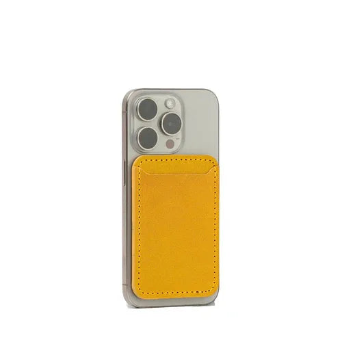 Mustard yellow leather iPhone wallet with strong MagSafe magnet, displayed on white background.