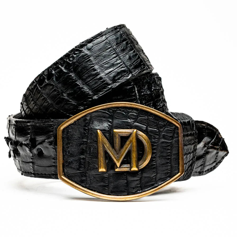 Close-up of Marlboro black belt showing genuine hornback caiman crocodile texture and detailed spine pattern.