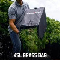 Rear view showing the mulch plug and grass collection bag attached to the mower.