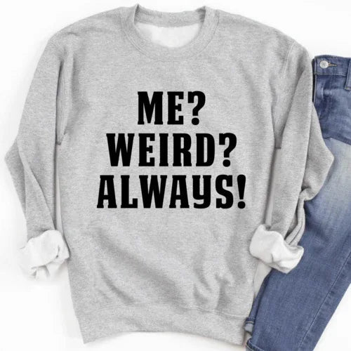 Sport grey sweatshirt featuring white bold text 'Me? Weird? Always!' on front, warm fleece with adjustable cuffs.