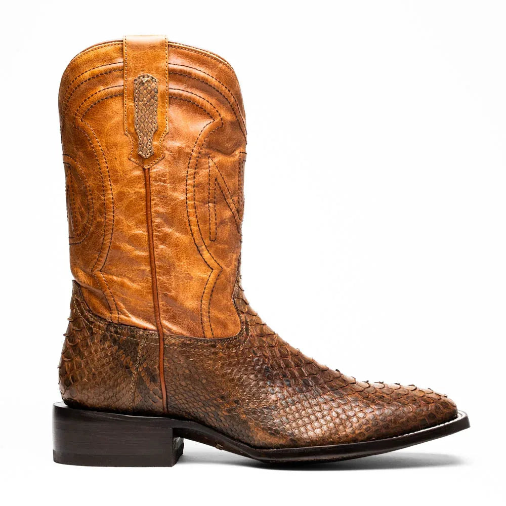 Side view of Missouri python skin cowboy boot in rich cognac color with red leather lining.