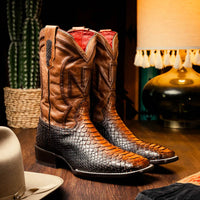 Missouri Lisboa python cowboy boot styled with casual Western outfit, highlighting boot’s bold design and craftsmanship.