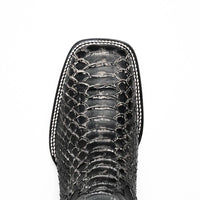 Close side profile of white python skin boot with square toe and full-grain leather shaft.