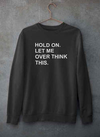 Back view of sweatshirt hanging to highlight fabric texture and cozy fleece lining.