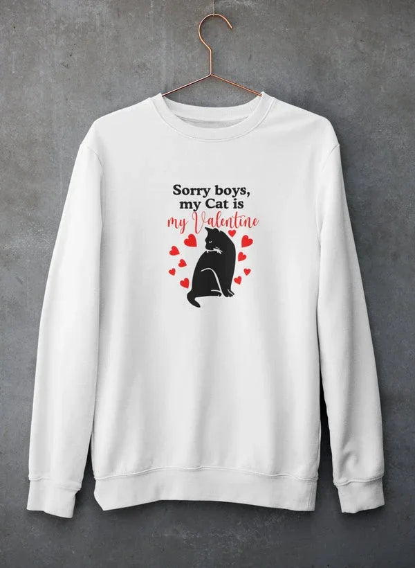 Grey sweatshirt hanging against concrete wall featuring 'Sorry Boys My Cat Is My Valentine' text and cat graphic design.