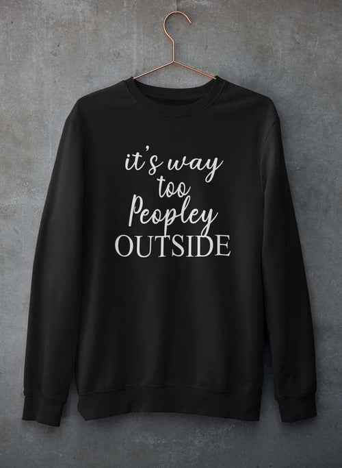 It's Way Too Peopley Outside Sweat Shirt hanging on a hanger against a gray concrete wall.