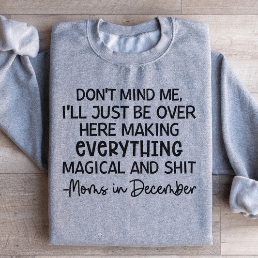 Sport grey Moms In December sweatshirt with cozy fleece lining and adjustable cuffs.