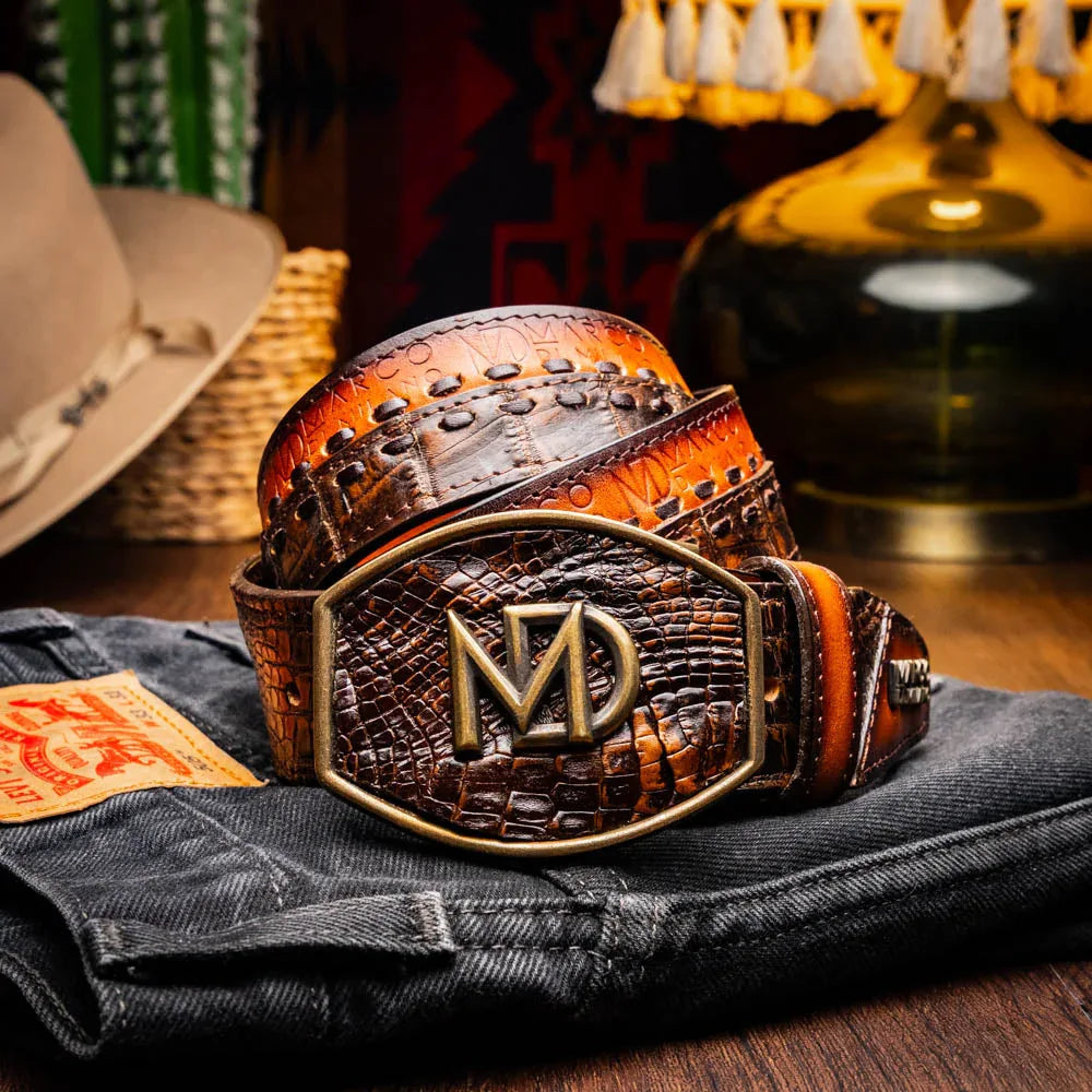 Lifestyle image of person wearing aged brown Montana Belt with jeans, emphasizing casual Western style.