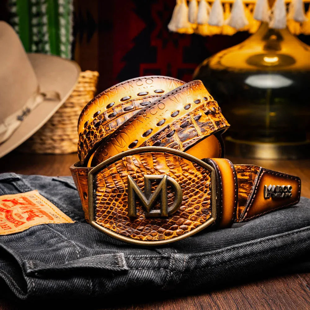 Lifestyle image of person wearing Montana Belt mustard brown with denim jeans.