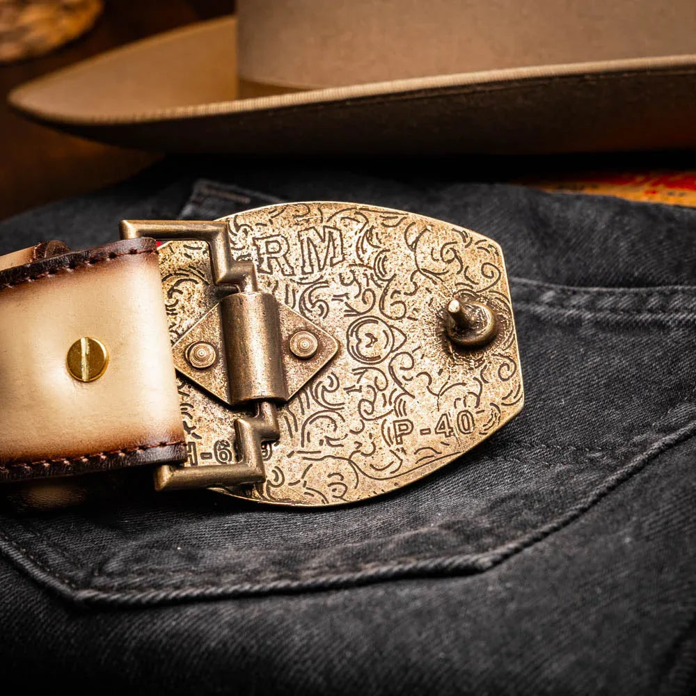 Styled photo of Montana belt with hand-stitched center detail worn over casual denim wear.