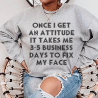 Peach fleece sweatshirt with crew neck and 'Once I Get An Attitude' white slogan on front.