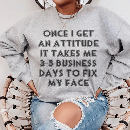 Peach fleece sweatshirt with crew neck and 'Once I Get An Attitude' white slogan on front.