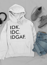 Close up of pullover hoodie paired with trendy sneakers and jeans, showcasing fabric texture.
