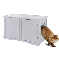 Simple white pet house style litter box enclosure blending with home decor.
