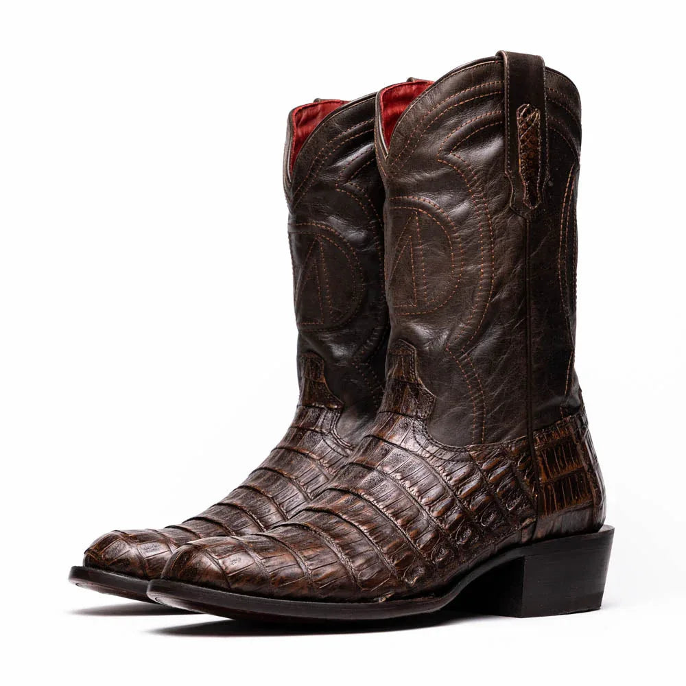 Front angle showing smooth texture and subtle belly-scale pattern on Phoenix Aged Brown boot.