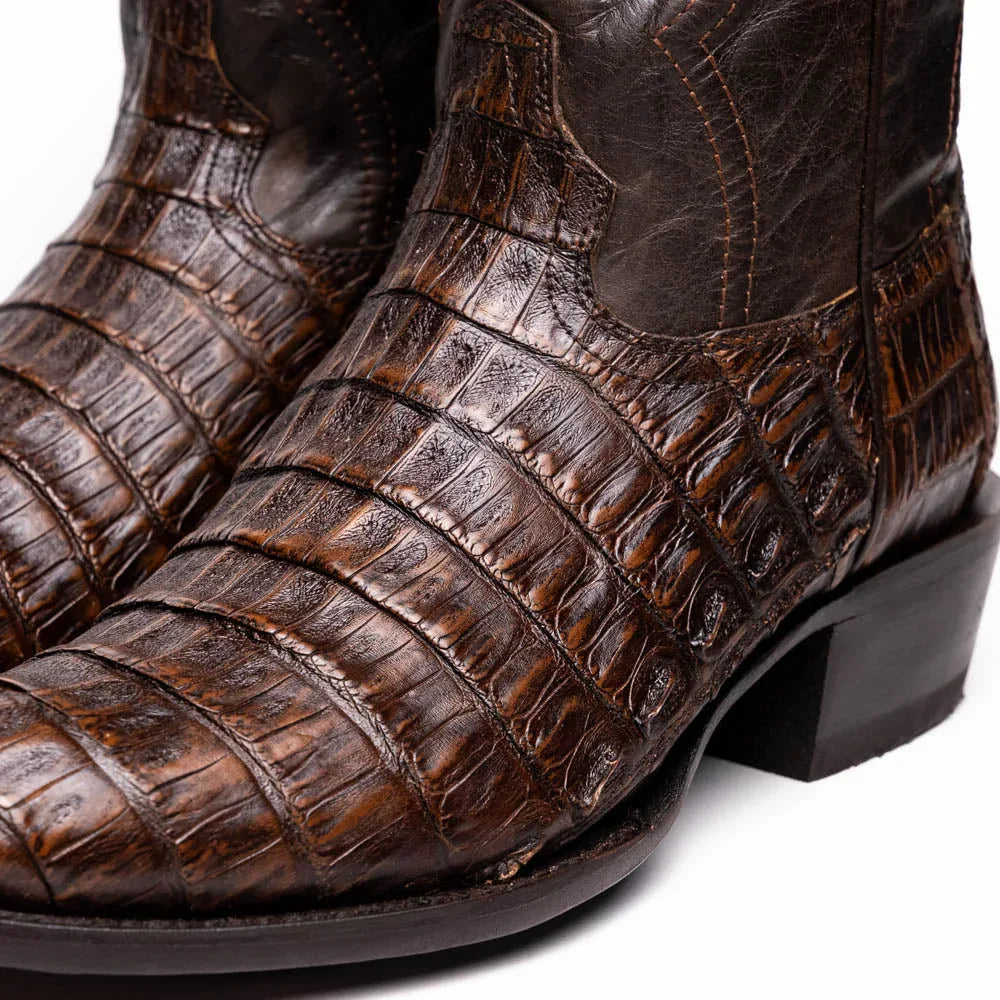 Detailed close-up of round toe and natural caiman skin pattern on Phoenix Aged Brown cowboy boot.
