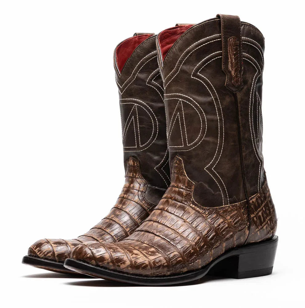 Phoenix Stone Brown cowboy boot angled to display full-grain leather shaft and detailed stitching.