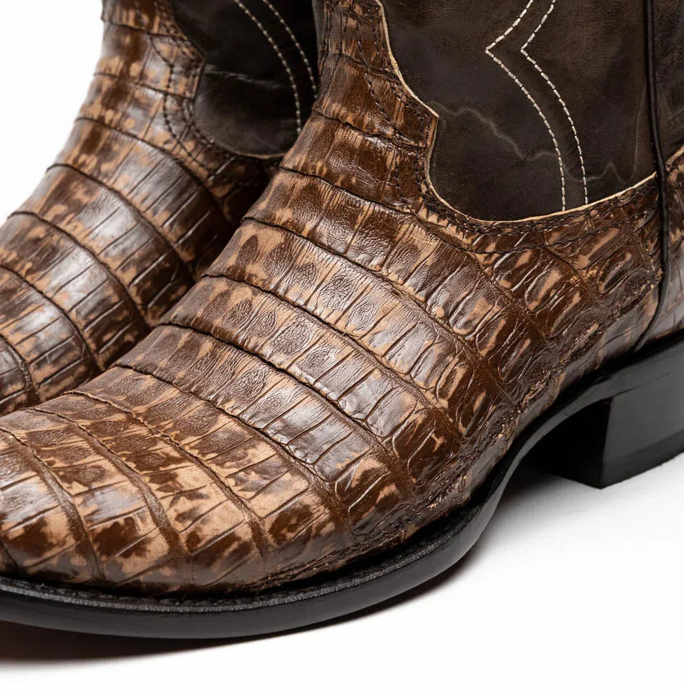 Top view of Phoenix Stone Brown cowboy boot highlighting round toe and subtle belly-scale pattern.