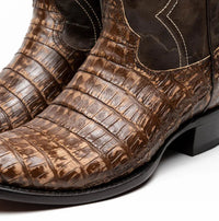 Top view of Phoenix Stone Brown cowboy boot highlighting round toe and subtle belly-scale pattern.
