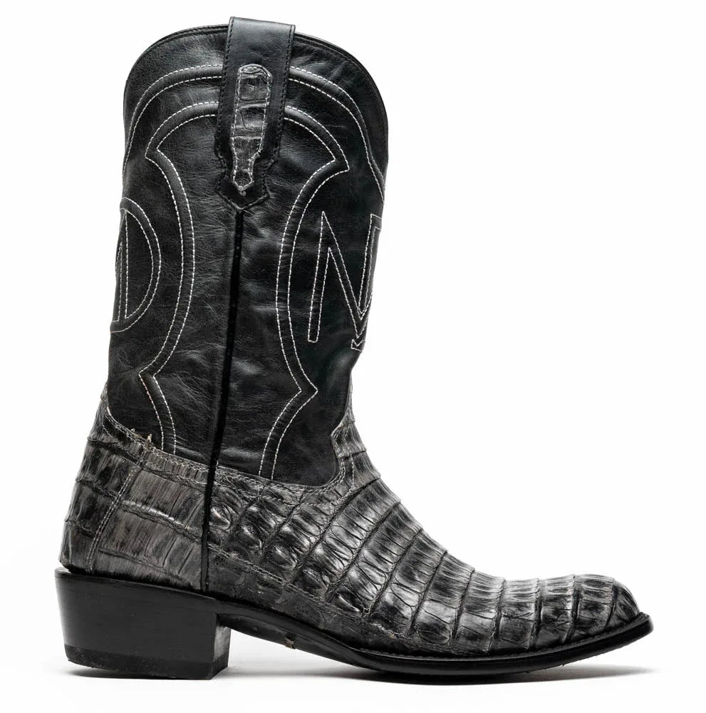 Angled view of Phoenix Stone Gray cowboy boot showing round toe and textured caiman belly skin vamp.