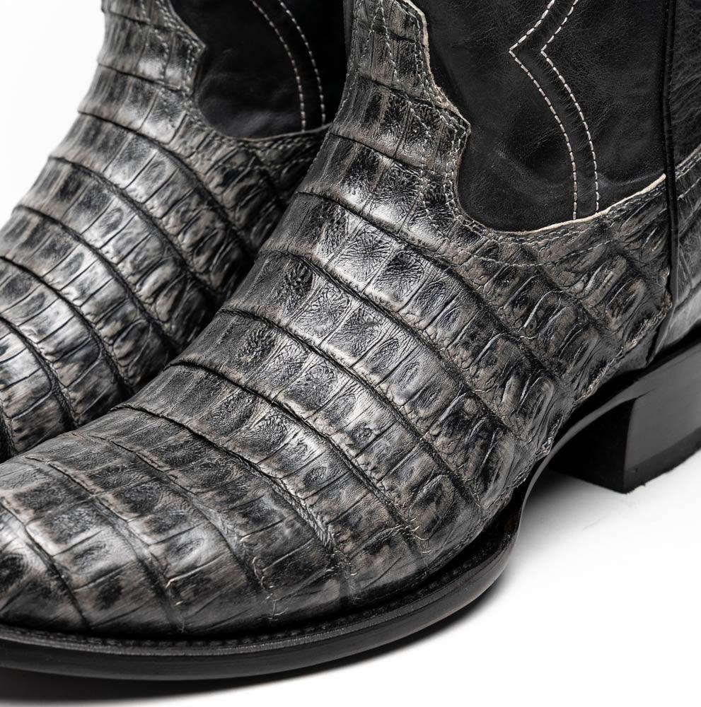 Detailed close-up of Phoenix Stone Gray cowboy boot heel and leather shaft with subtle texture.