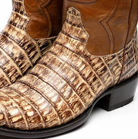 Profile angle of Phoenix Stone Orix boot displaying polished leather shaft and distinctive western design
