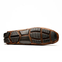Pia Cognac python skin shoe angled to show side profile and texture depth.