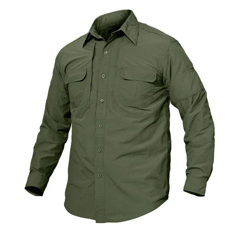 Man wearing army green tactical long sleeve shirt in outdoor urban setting.