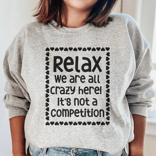 Sport grey sweatshirt with 'Relax We Are All Crazy Here' text in white script on chest.