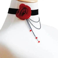 Close-up of black lace necklace showing detailed scalloped edges and mesh design.