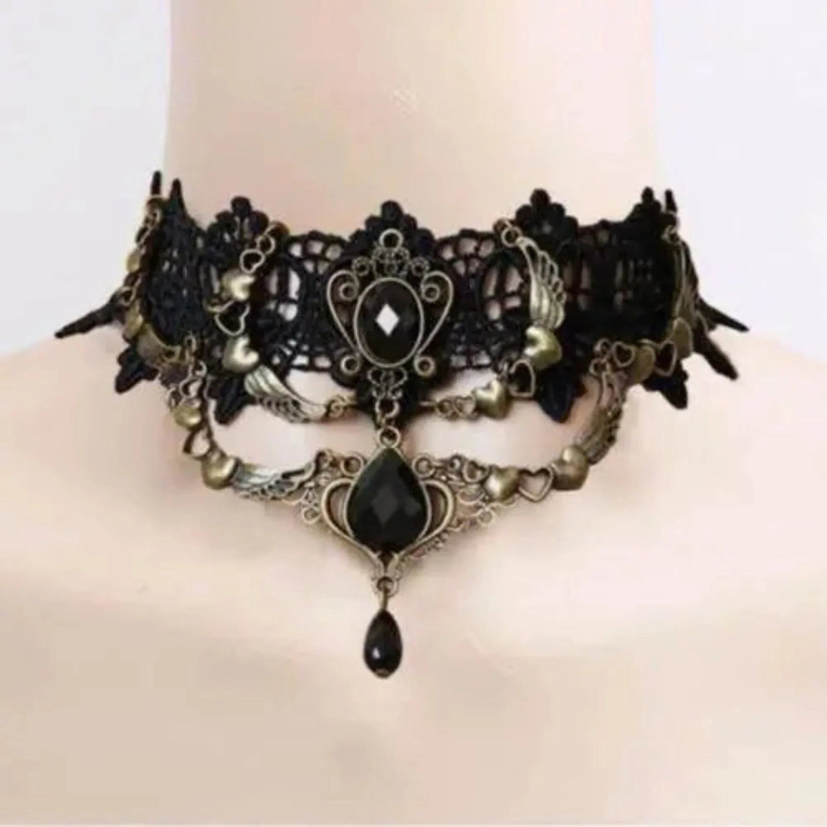 Black lace necklace styled with a dark outfit, emphasizing its bold yet elegant look.