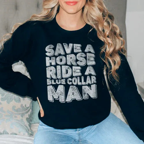 Black sweatshirt with the slogan 'Save A Horse Ride A Blue Collar Man' displayed in white and blue text.