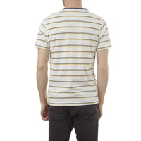 Model wearing Edgar Striped Tee paired with casual pants, highlighting the overall look.