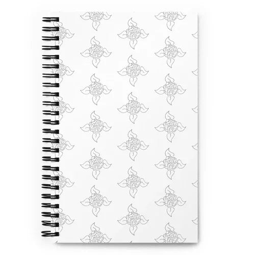Front view of floral spiral notebook with soft-touch coated orange cover.