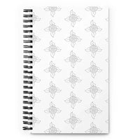 Front view of floral spiral notebook with soft-touch coated orange cover.