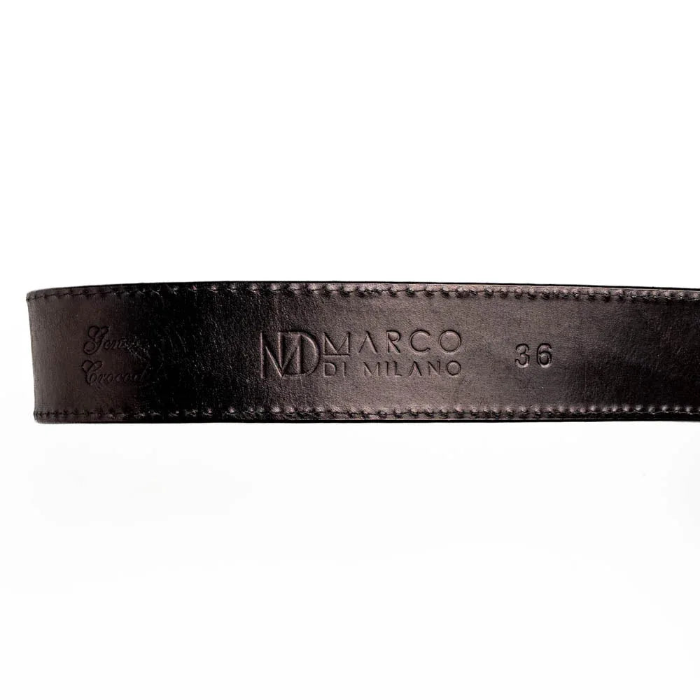 Detailed shot of Texas Belt’s antique-finish western buckle and textured caiman crocodile leather