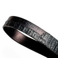 Profile close-up highlighting the contrast between crocodile skin and calf leather on Texas Belt
