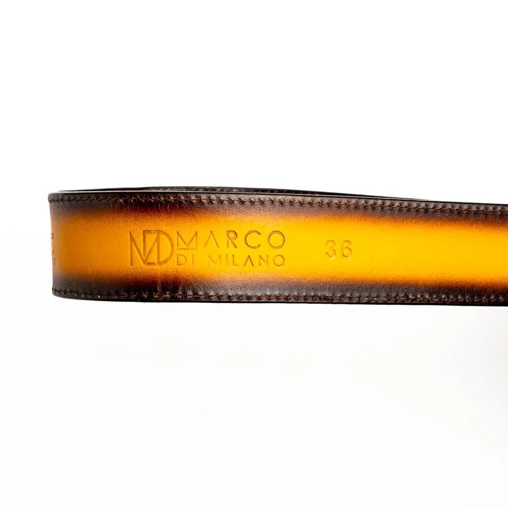 Texas Belt laid flat showing full length with signature hot-stamped branding on calf leather.