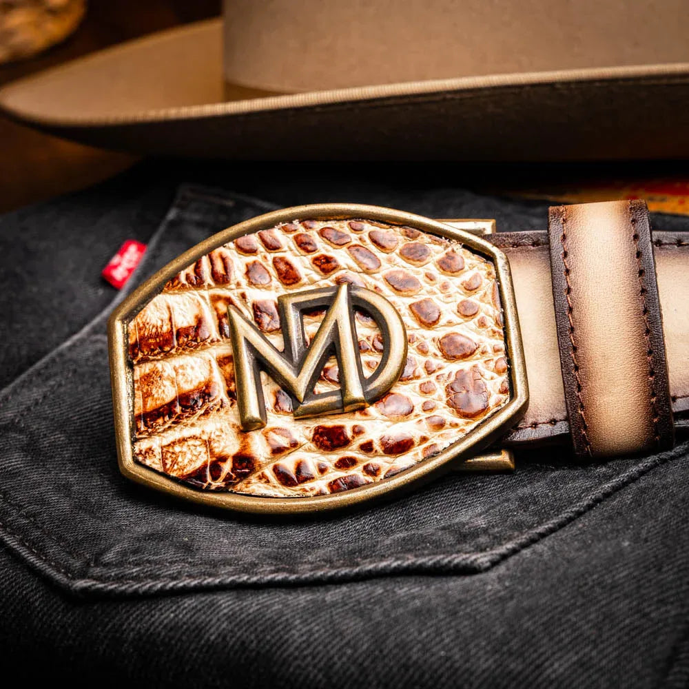 Model close-up showing textured caiman leather and antique buckle of Texas stone orix belt.