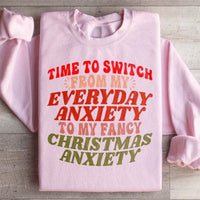 Light pink sweatshirt displaying the text 'Time To Switch From My Everyday Anxiety To My Fancy' in white font.