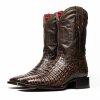 Top angle showing full boot shape with signature red lining and rugged caiman skin texture.