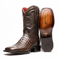 Close-up of Tucson Aged Brown cowboy boot showing textured caiman belly skin and square toe.