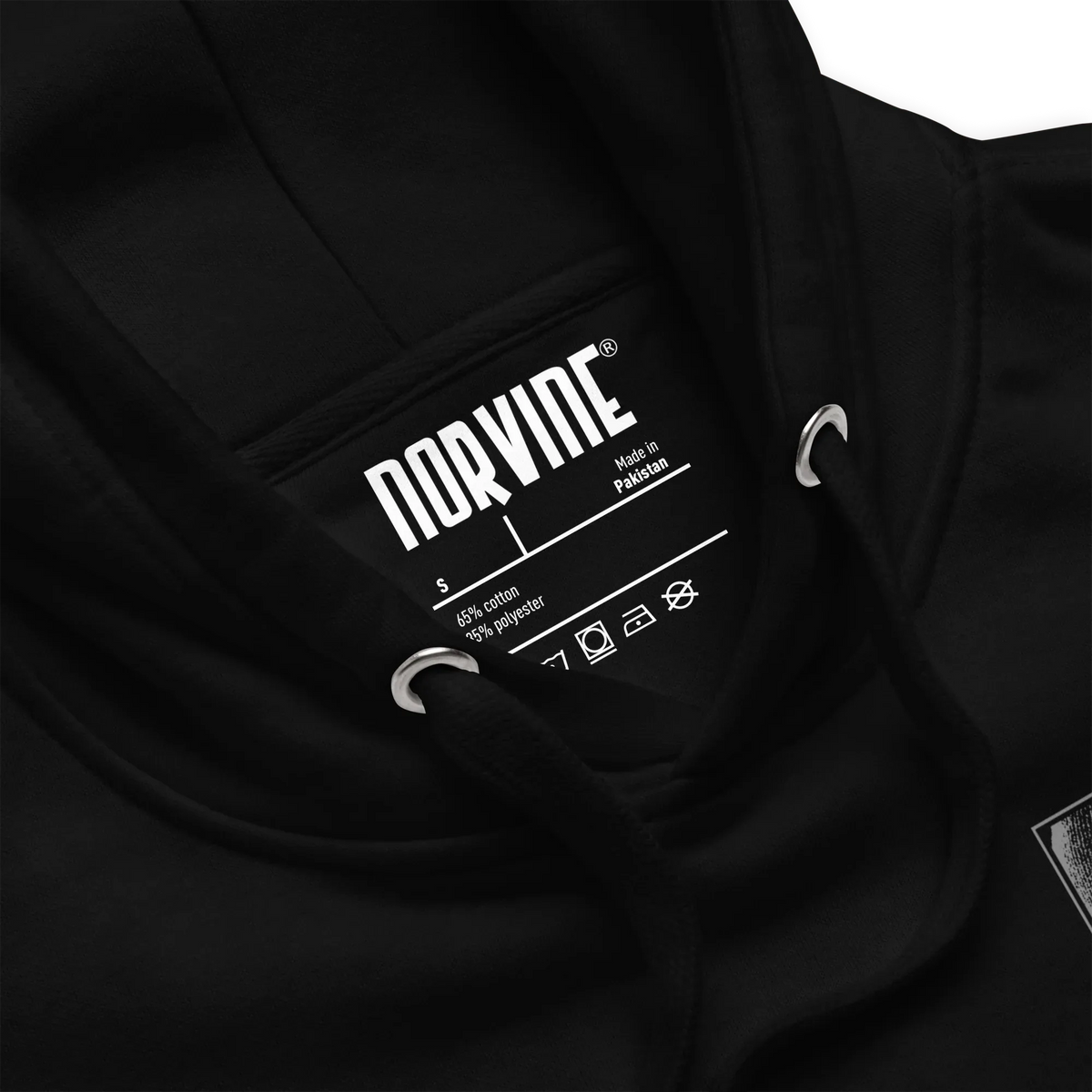 Close-up of Norvine Rebel Mask hoodie showing fabric texture and matching flat drawstrings.