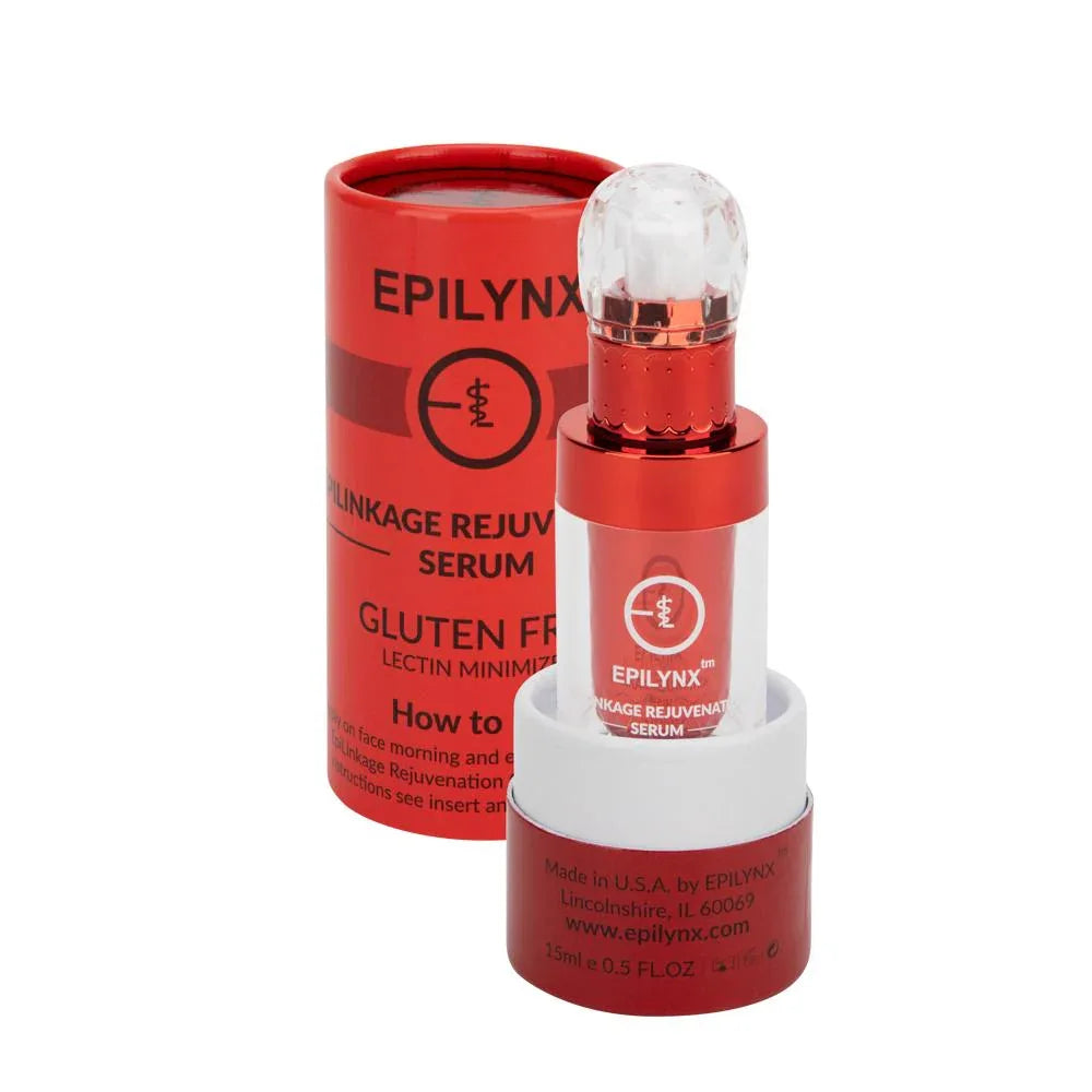 Hand holding serum bottle with dropper, dispensing product onto skin.