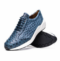 Close-up of luxury navy blue sneaker made from genuine ostrich skin showing textured material and clean white sole.