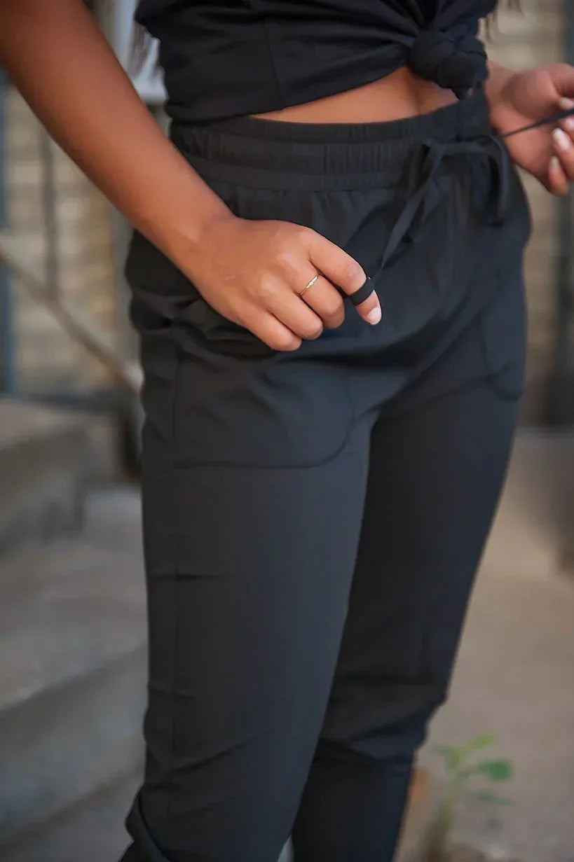 DT UPTOWN Lightweight Joggers in Black - Snagva