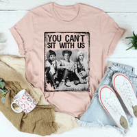 Heather peach t-shirt with prominent black 'You Can't Sit With Us' text on front.
